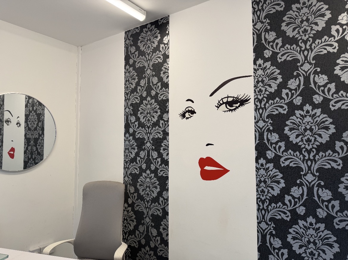 Inside Marta & Maryam Beauty salon — signature feature wall